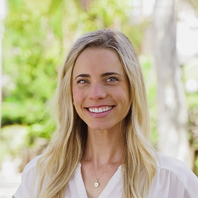 Chiropractor Chloé Lightner Smiling Outdoors