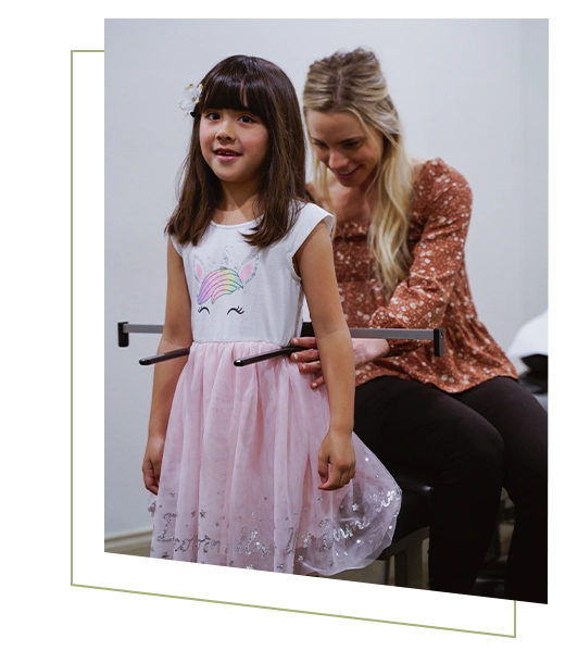 Chiropractor Chloé Lightner Examining Pediatric Patients Posture